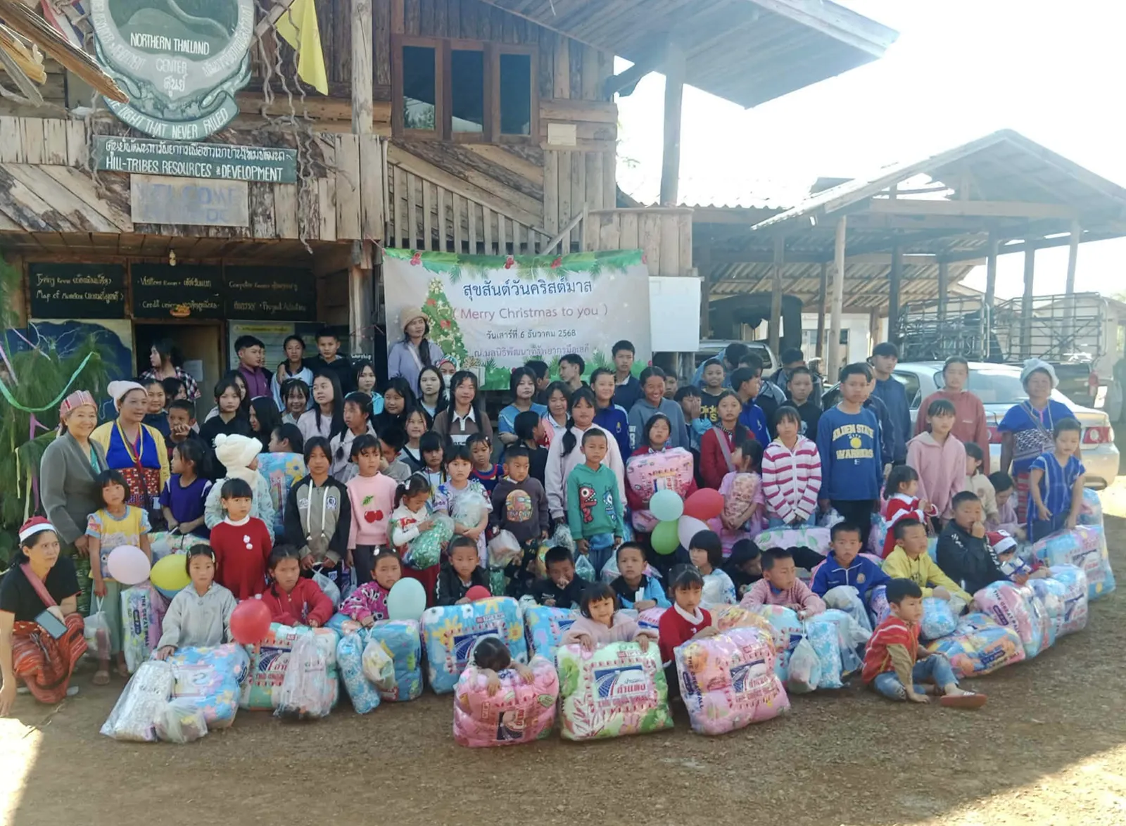 Children gathered with a ministry partner overseas